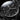 Close-up of a black wristwatch with detailed face and brand name.