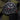 Watch with a black dial and green strap on a dark background