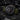 Black watch with green strap on a camouflage background